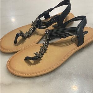 Stylish Black and Tan Sandals with Floral Design